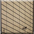 A09. Geometric art photo of a building and flag signed Joe Ofria. 11”w x 14”h - $18 